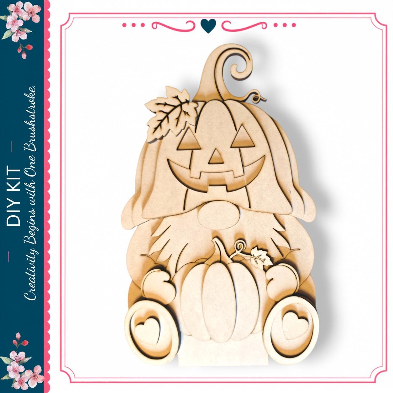A wooden Halloween pumpkin decoration with a carved face and leaves, sitting on a white background.