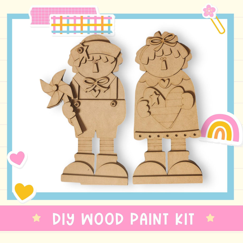 a wooden cutout of two people holding hands