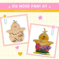 a wooden craft kit with two pictures of a chicken and a chick