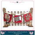 A rustic farmhouse-style DIY kit featuring a wooden fence with decorative elements such as gingerbread man and heart-shaped cutouts, along with a caption that reads "Creativity Begins with One Brushstroke - RUSTIC FARMHOUSE - DIY KIT".