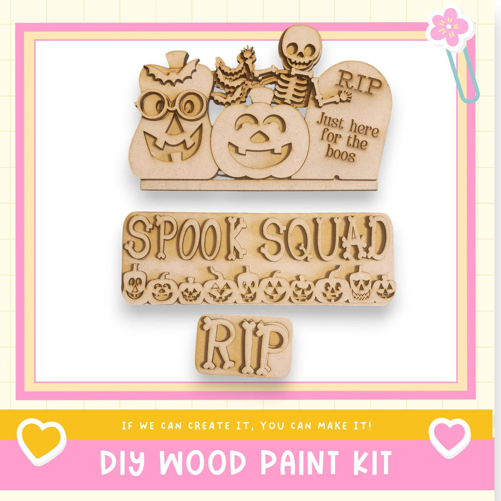 The image is a promotional poster for a DIY wood paint kit, featuring a skeleton, jack-o-lantern, and tombstone decoration.