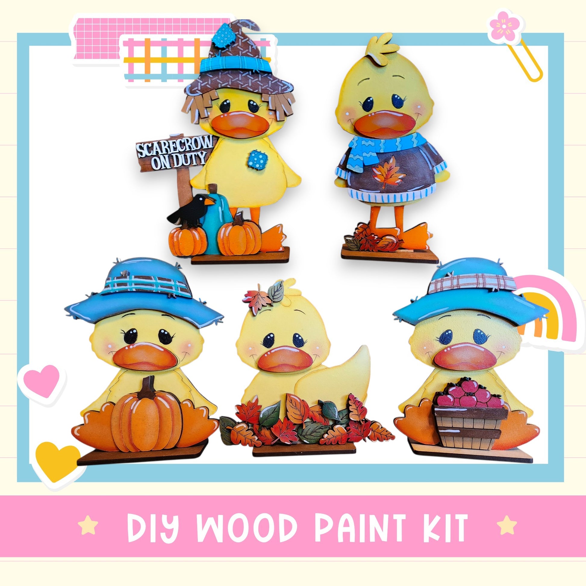 The image is a collage of five wooden duck figurines, each wearing a different hat and holding various fall-themed items such as pumpkins and apples. The text "DIY WOOD PAINT KIT" is displayed at the bottom of the image.