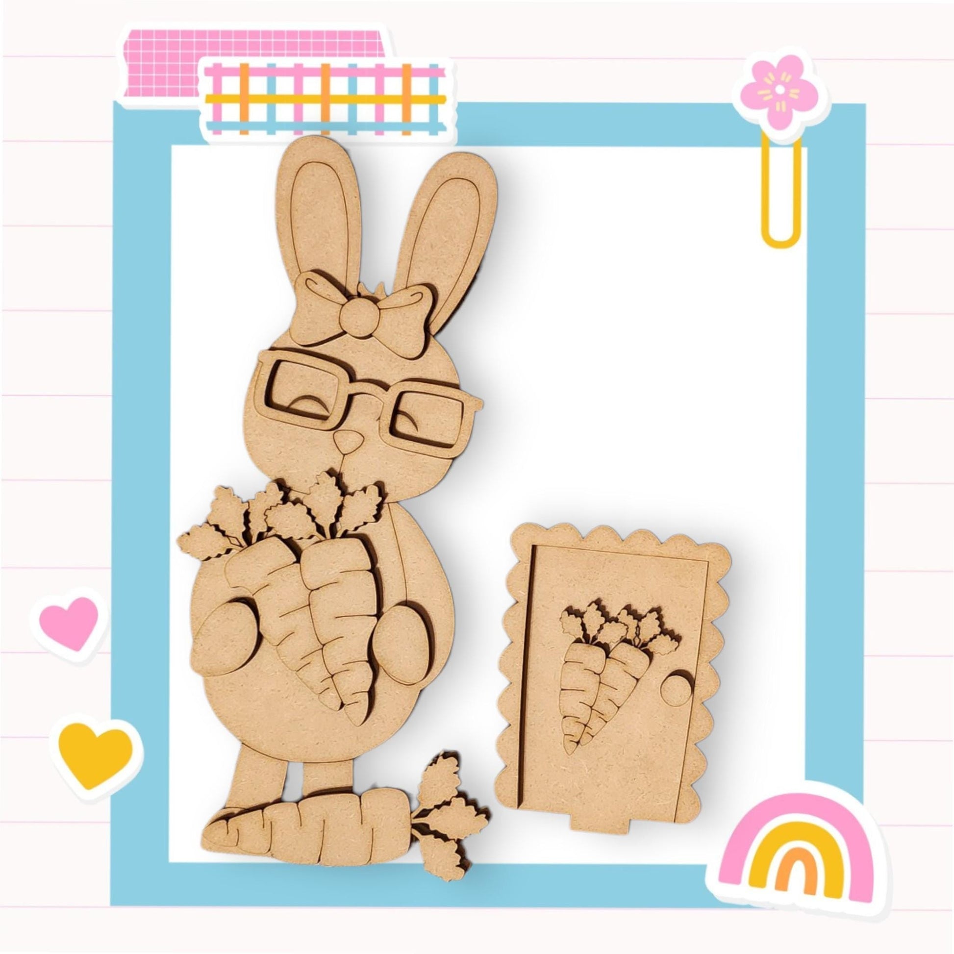 a wooden cutout of a rabbit holding a picture frame