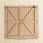 A wooden door with a latch and two knobs, mounted on a wall.