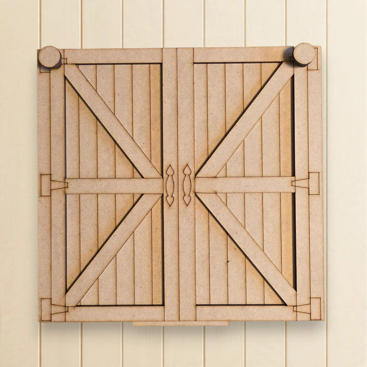 A wooden door with a latch and two knobs, mounted on a wall.