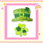 a st patrick's day card with a green hat and shamrock