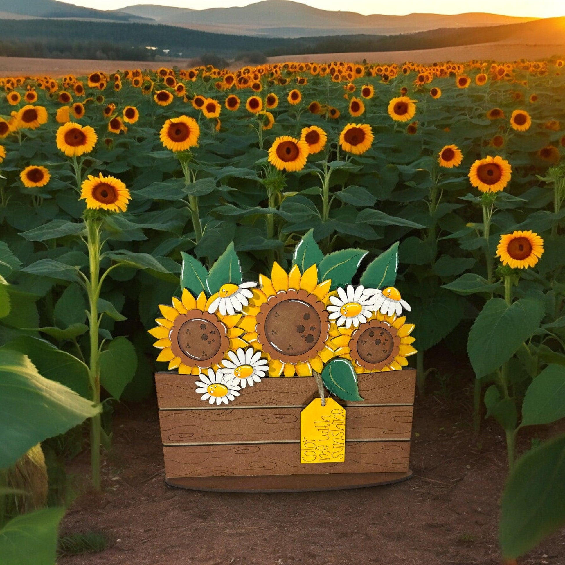 a wooden box with sunflowers in a field of sunflowers