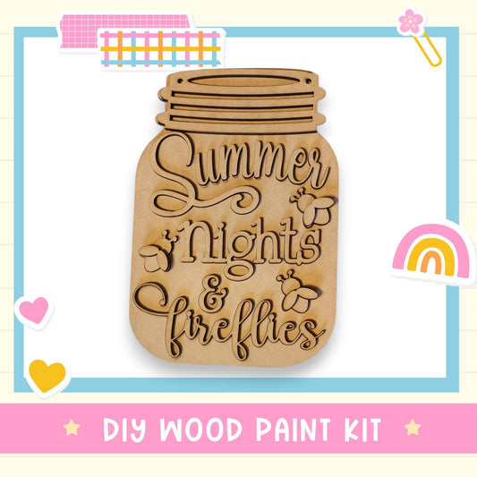 a DIY wood paint kit with a wooden mason jar as the main focus. The kit includes a wooden mason jar with a lid and a wooden sign that says &quot;Summer Nights & Fireflies&quot;. The kit is presented in a colorful and playful manner, with various decorative elements surrounding the mason jar and sign.