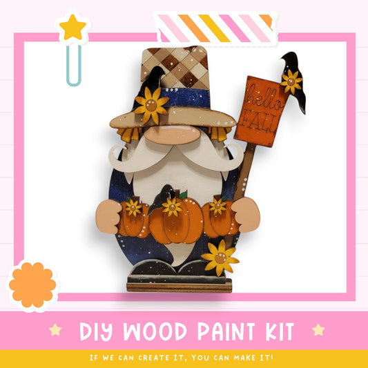 a wooden carving of a gnome holding a sign