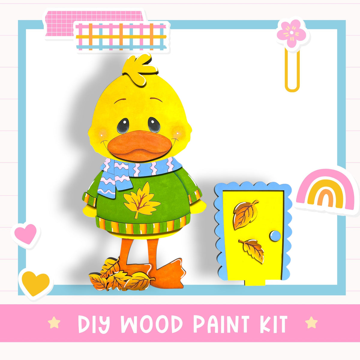 A wooden paint kit featuring a yellow duck wearing a green sweater and scarf, with a yellow door and a rainbow-colored sticker in the background.