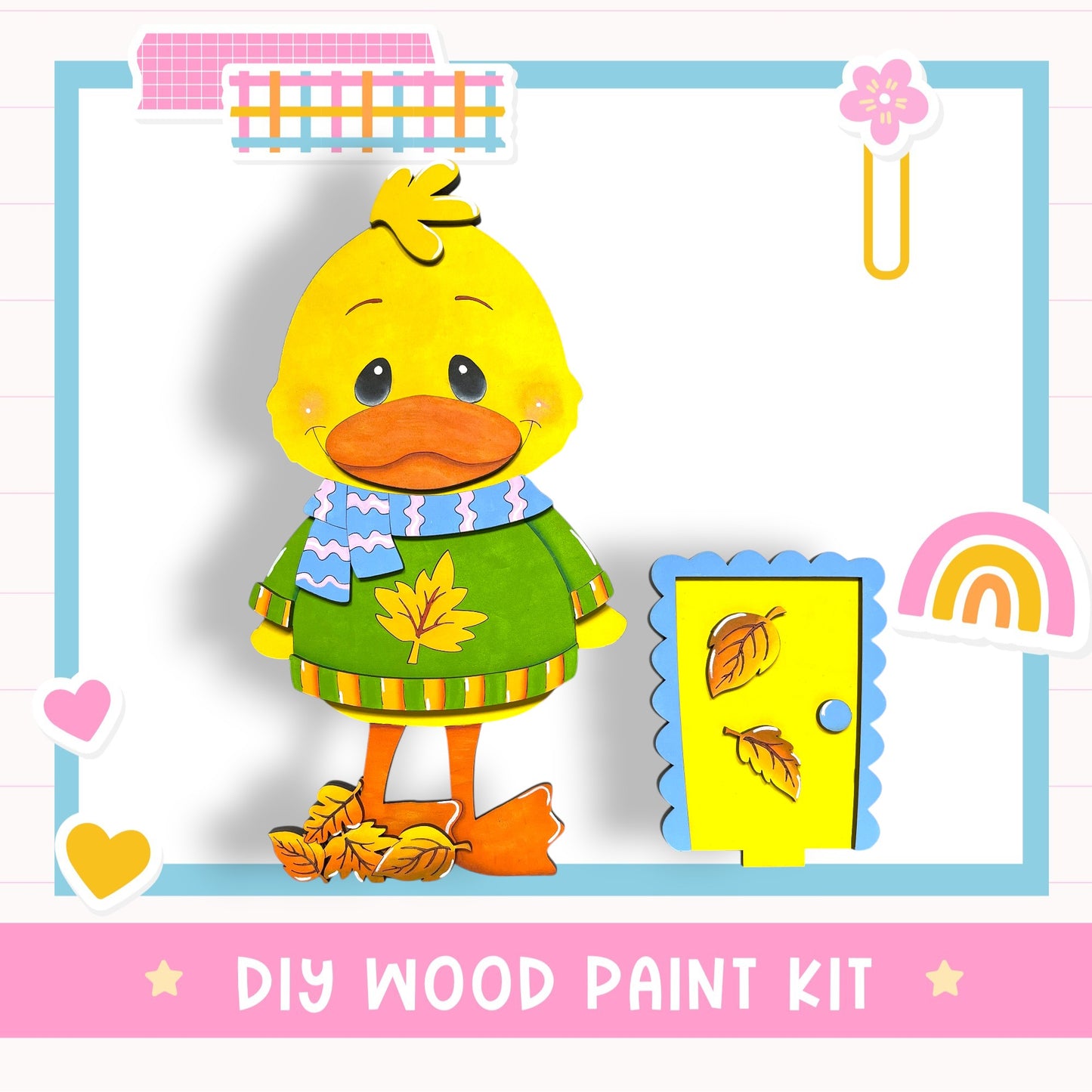 A wooden paint kit featuring a yellow duck wearing a green sweater and scarf, with a yellow door and a rainbow-colored sticker in the background.