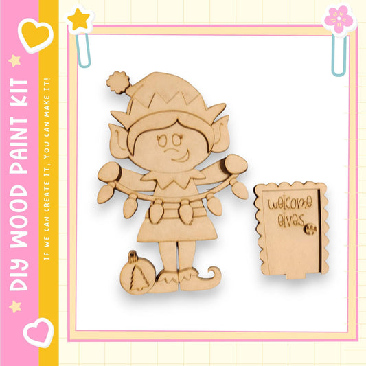 A wooden elf figurine with a sign that says "Welcome Gives" next to it.