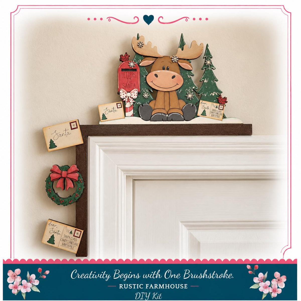 A wooden moose figurine is perched on a shelf above a door, surrounded by holiday decorations such as a wreath, a mailbox, and a "Santa" card.
