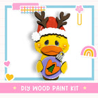 A cheerful cartoon duck wearing a Santa hat and holding a Christmas ornament, with the text "DIY WOOD PAINT KIT" below the image.