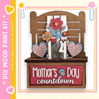 The image is a wooden paint kit for creating a Mother's Day countdown display.