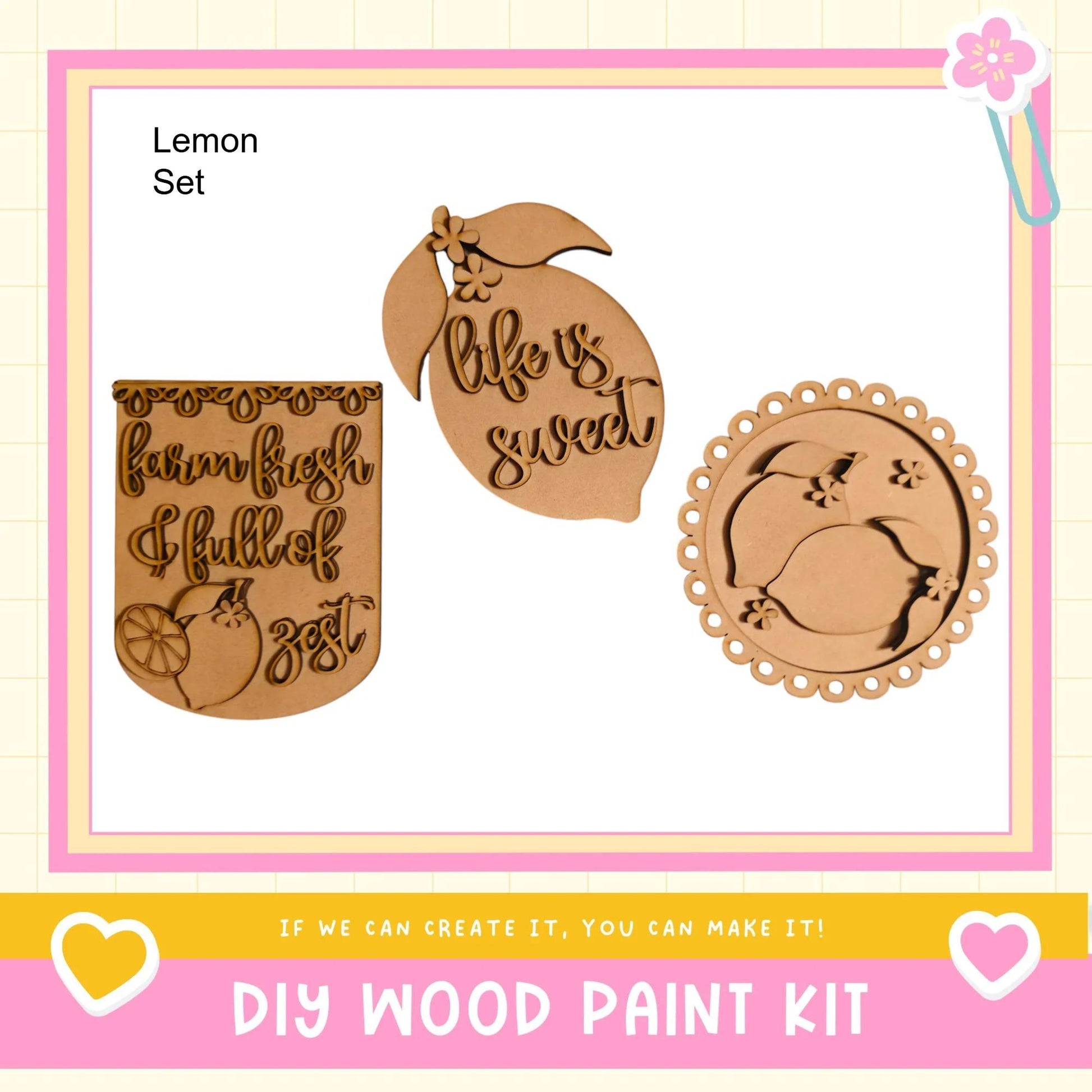 The image is a DIY wood paint kit advertisement, featuring three wooden shapes with text and a heart symbol.
