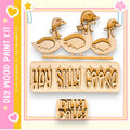 a wooden cutout of three wooden ducks, with the text "Hey Silly Goose" carved into the ducks.