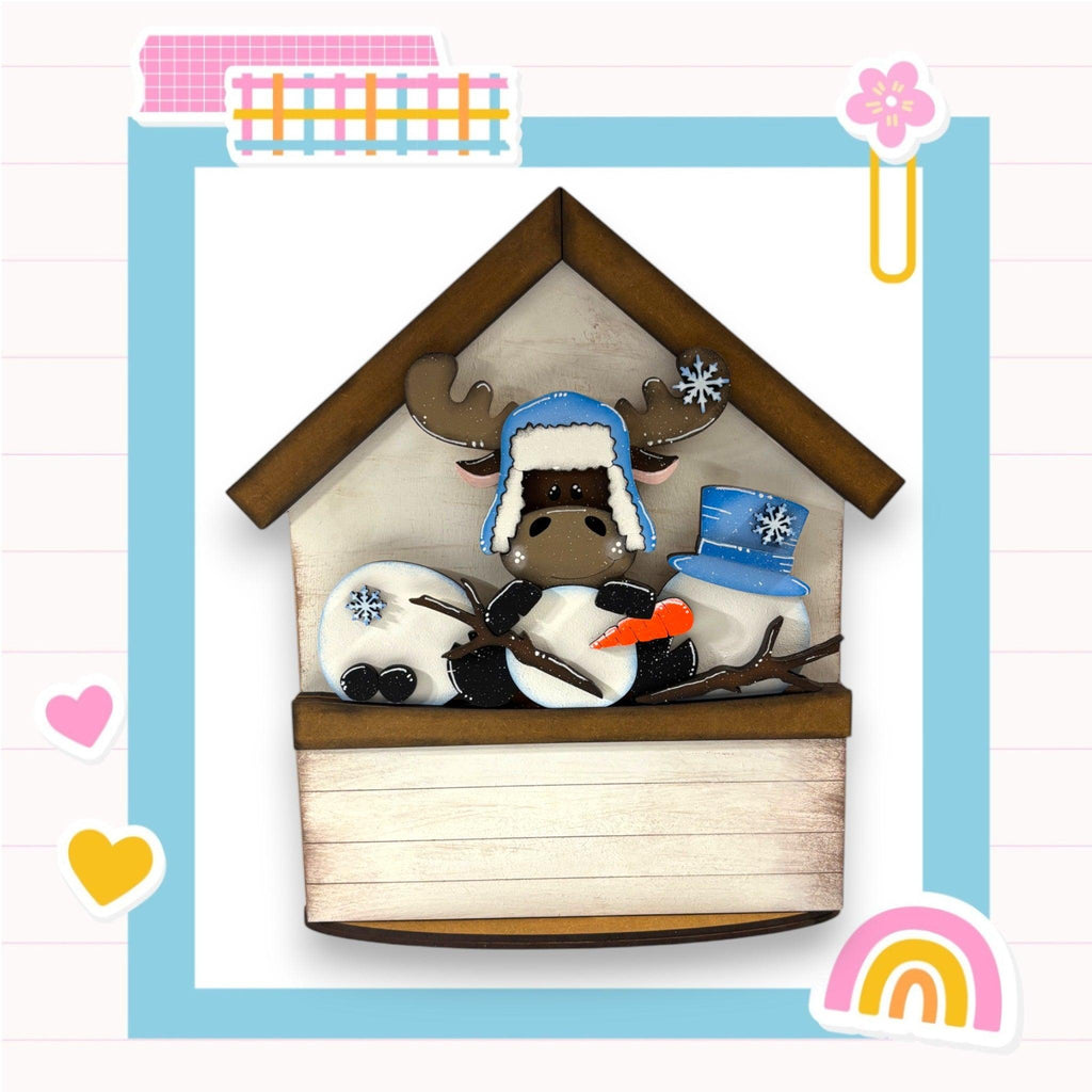 a picture of a cow in a bird house
