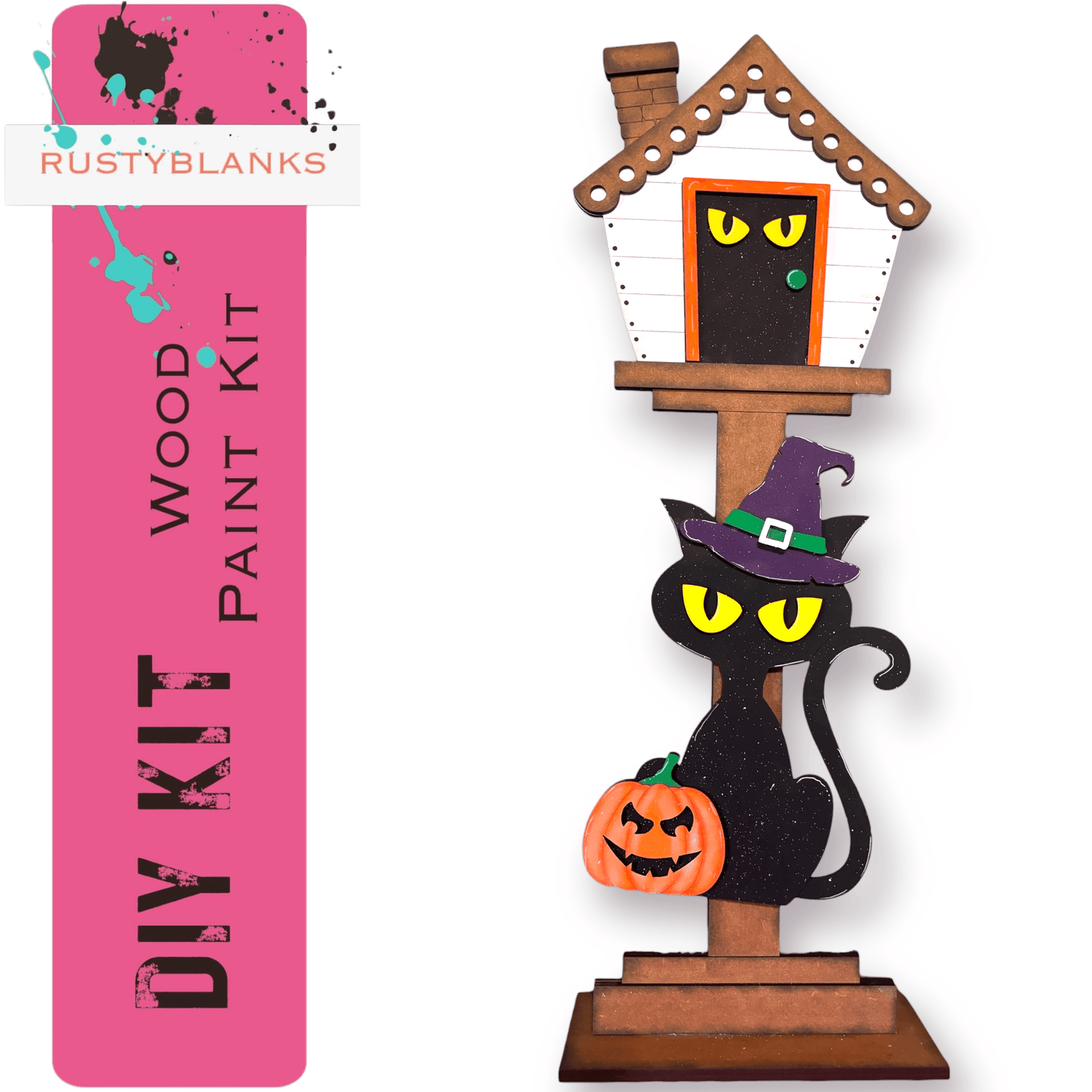 a wooden halloween decoration with a cat and a house