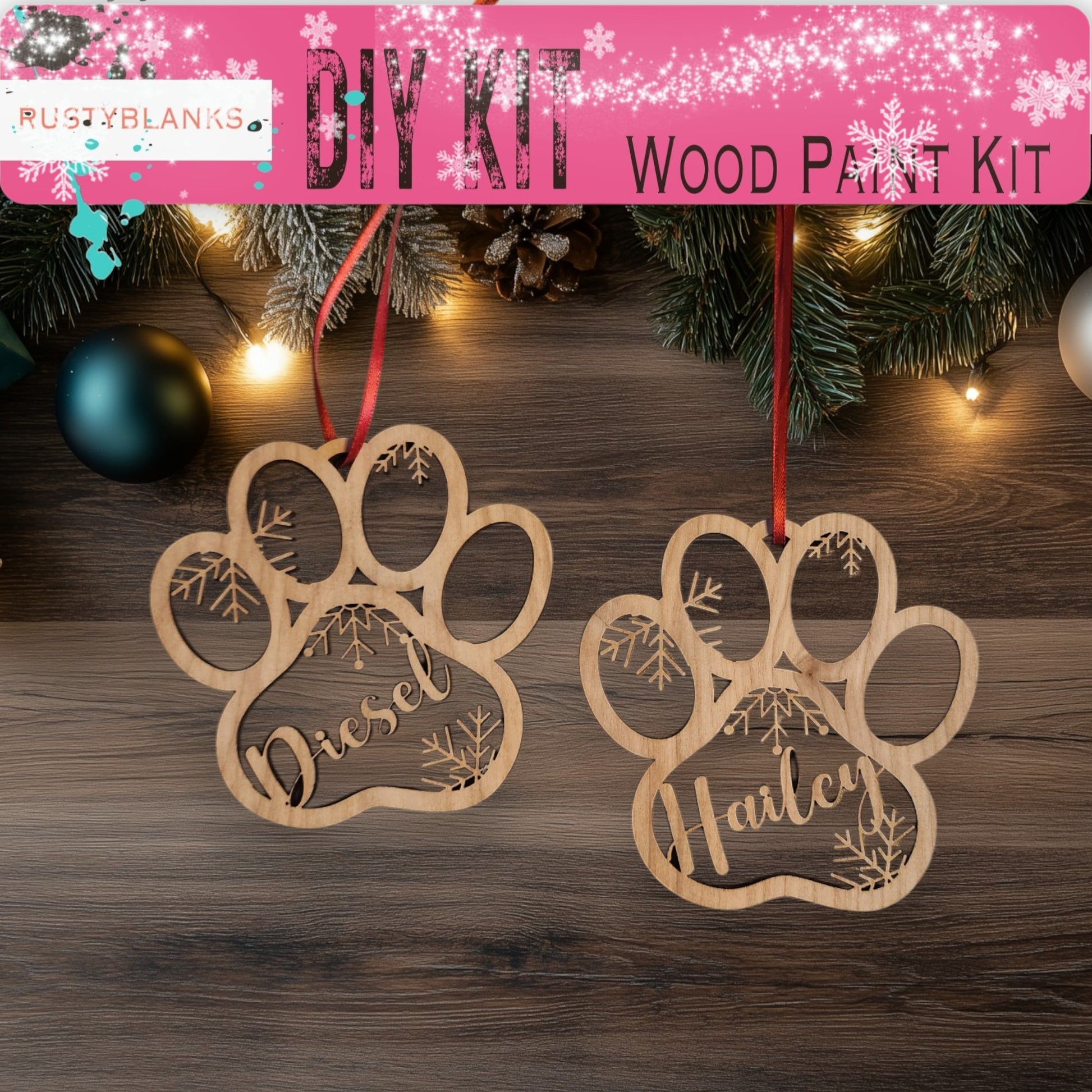 two wooden paw prints hanging from a christmas tree