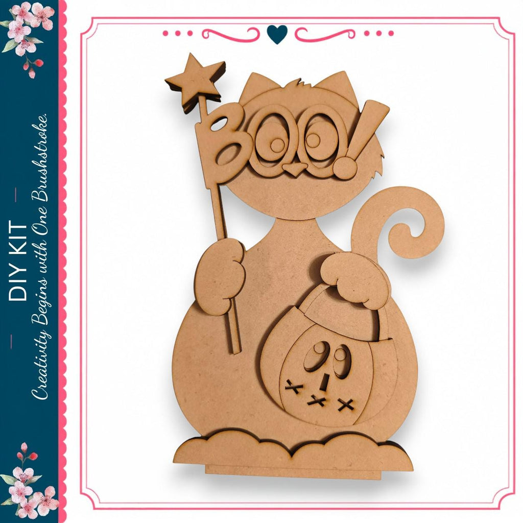 A wooden cutout of a cat holding a star and a carved pumpkin with a face.