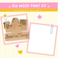 a wooden craft kit with a picture of a man and a woman