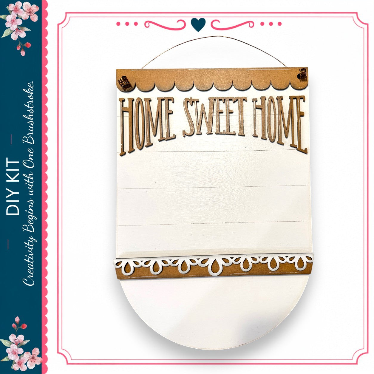 a wooden sign with the text "HOME SWEET HOME" written on it. The sign is hanging on a wall and appears to be a DIY kit.