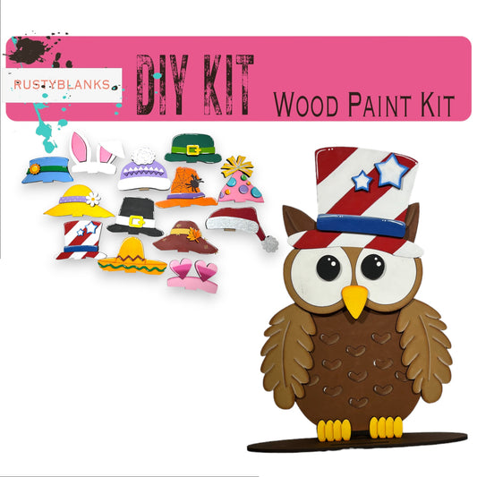 a wooden craft kit with an owl wearing a top hat