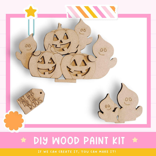 The image is a DIY wood paint kit featuring a Halloween-themed design with carved pumpkins and ghostly figures.