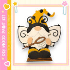 A whimsical wooden gnome figure with a bee-like appearance, holding a net and wearing a hat with a yellow and black pattern.
