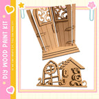 a wooden door and a small wooden house, both crafted from wood and displayed against a white background.
