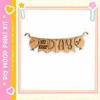 a banner with the word "DAYS" written on it, hanging from a frame.