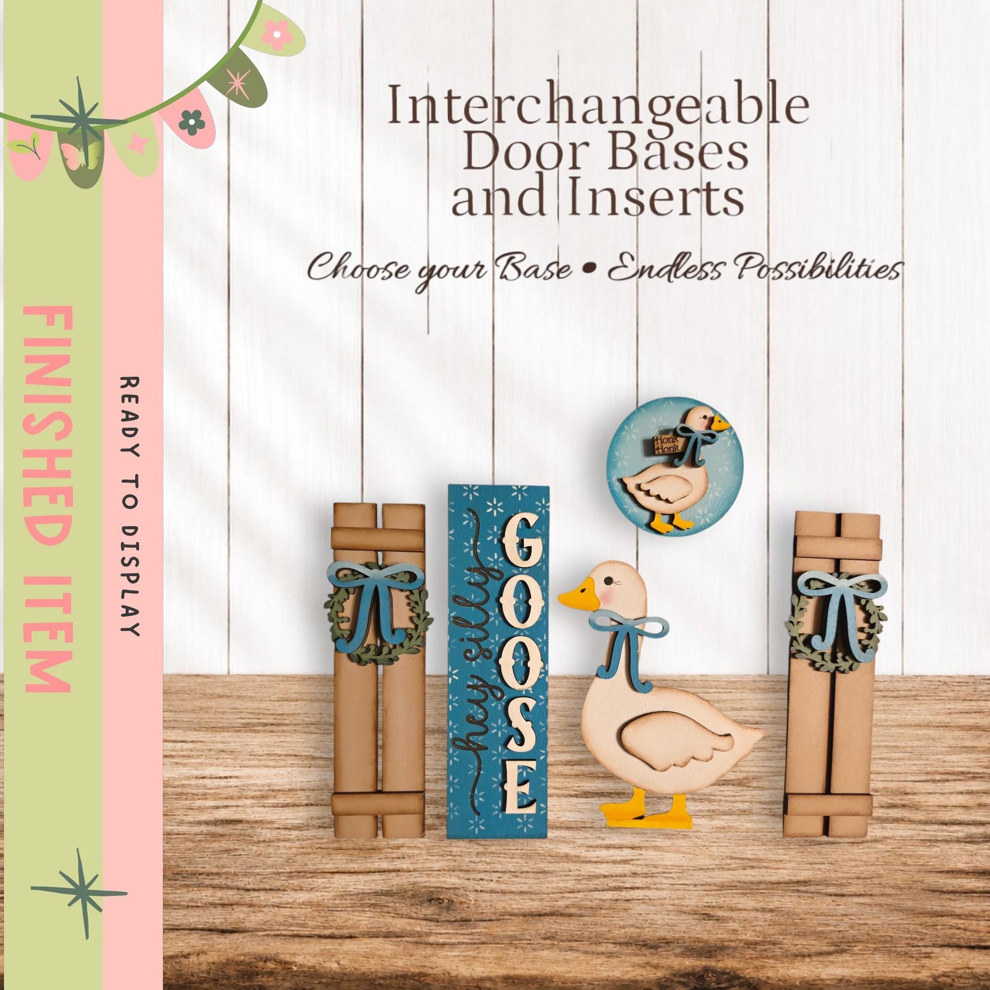 The image is a collection of wooden door bases and inserts, including a goose-themed door base and a wreath-adorned door base, arranged on a wooden surface.