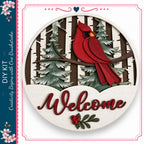 A wooden sign with a red cardinal perched on a branch, surrounded by pine trees and berries, with the word "Welcome" written on it.