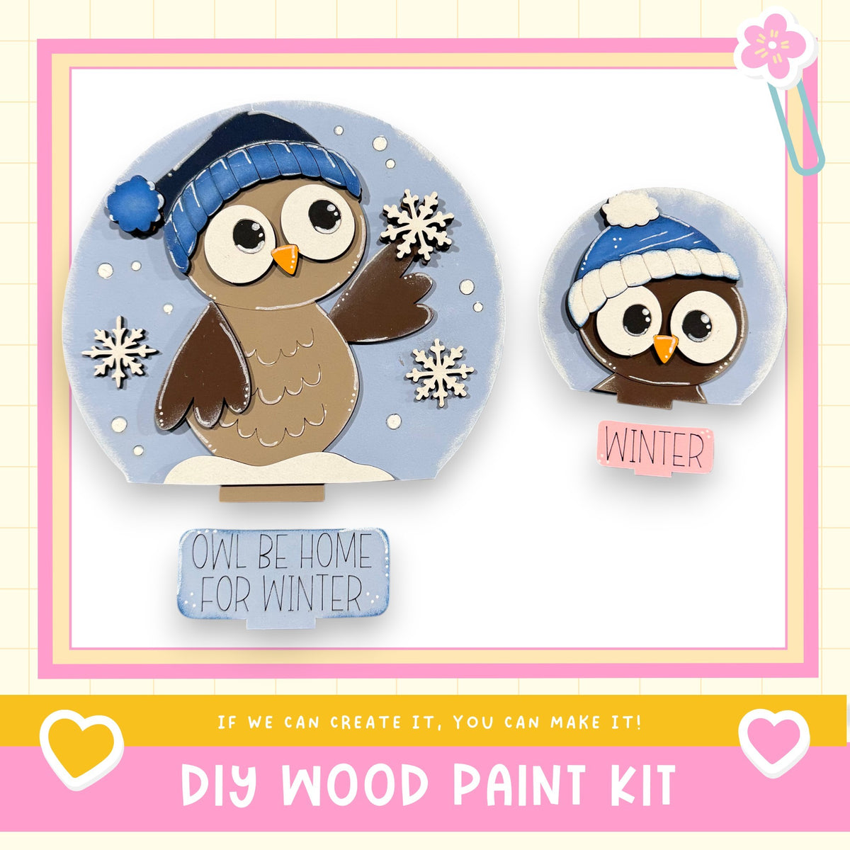 The image is a DIY wood paint kit featuring two wooden owl figures, one larger and one smaller, wearing winter hats and surrounded by snowflakes. The kit includes a sign that says " Owl Be Home for Winter" and a heart symbol, suggesting the kit is designed for creating winter-themed decorations or gifts.