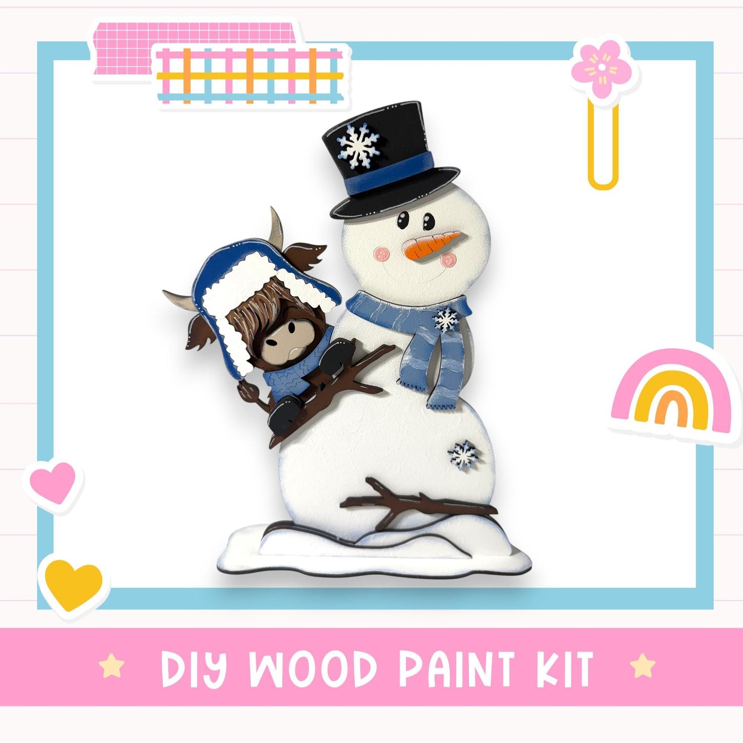 A snowman and a cow figure are depicted in a DIY wood paint kit, surrounded by various colorful stickers and a heart shape.