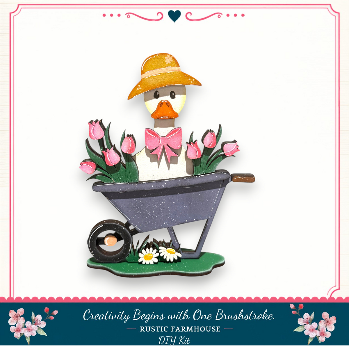 A wooden duck wearing a hat and holding pink flowers in a wheelbarrow, with a text overlay that says "Creativity Begins with One Brushstroke. Rustic Farmhouse DIY Kit".