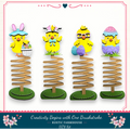 a group of paper cut outs of easter chicks