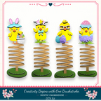 a group of paper cut outs of easter chicks