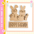 A wooden Easter bunny decoration with the text "Happy Easter" on it, along with a "DIY WOOD PAINT KIT" label.