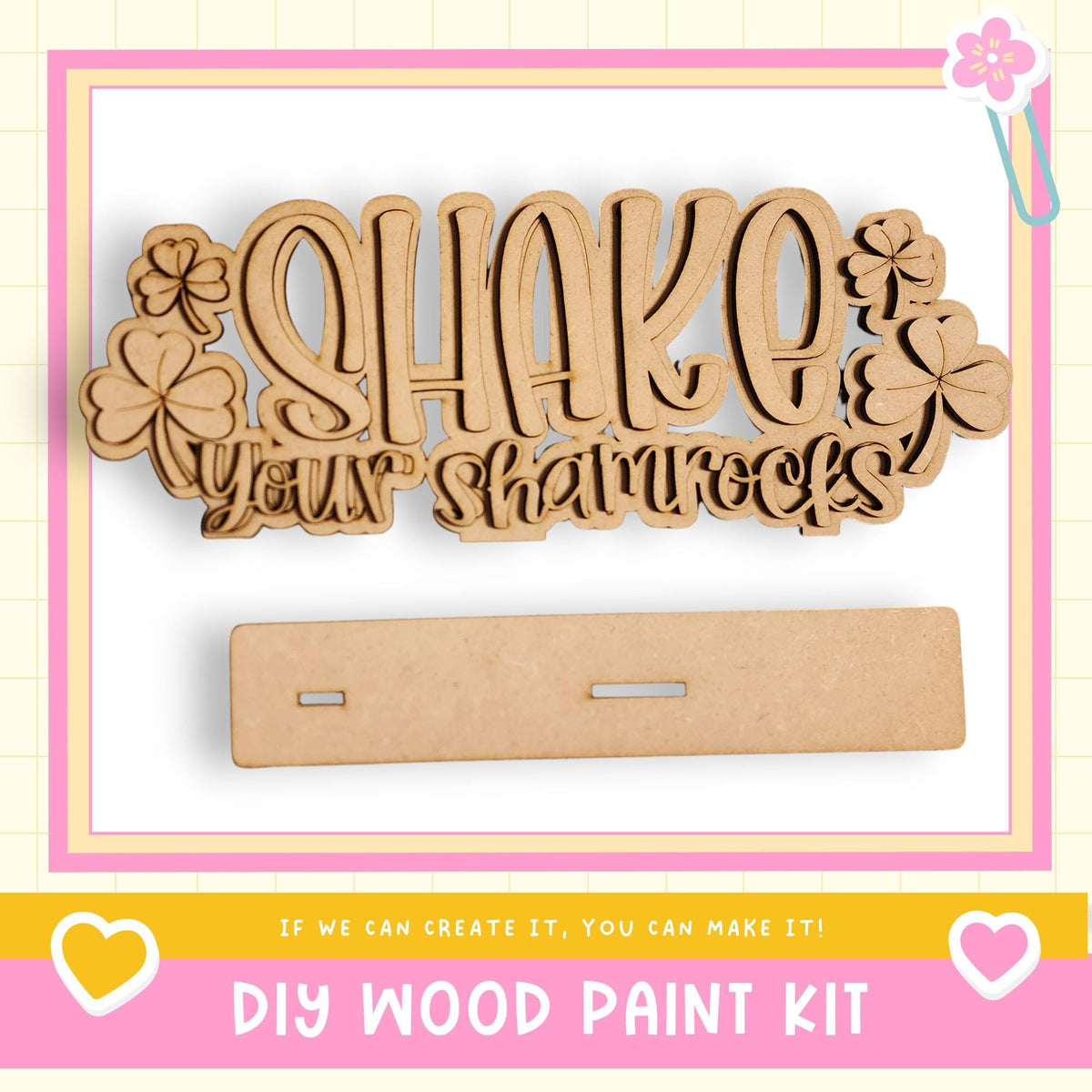 The image is a DIY wood paint kit advertisement, featuring a wooden sign with the text "SHAKE your shamrocks" and a blank wooden board.