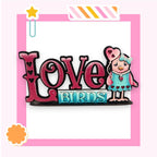 a picture of a pin with the word love birds on it