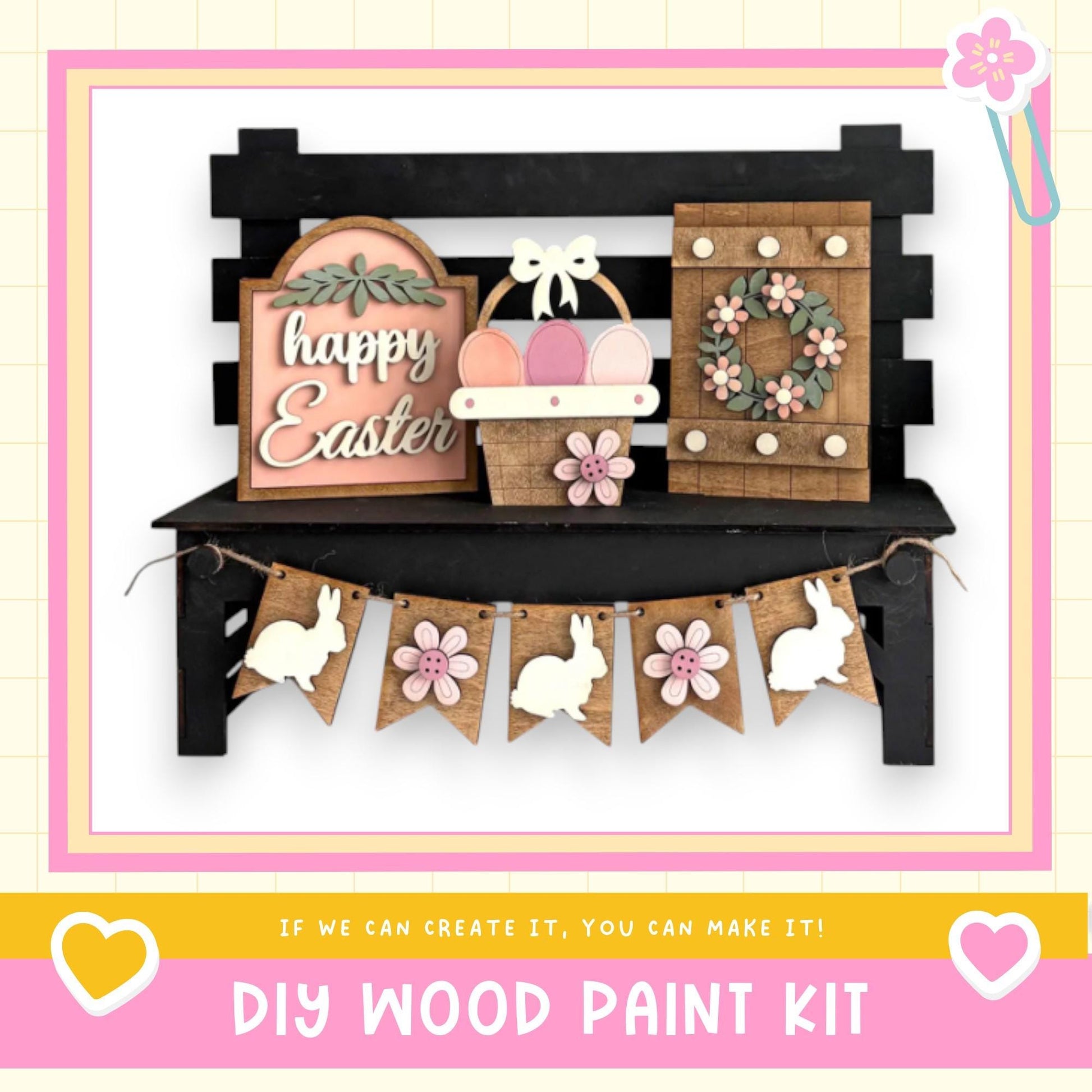 A DIY wood paint kit for creating Easter decorations, including a sign, a wreath, and a banner with wooden rabbits.