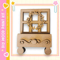 a wooden craft kit with a wreath design on a wooden base.