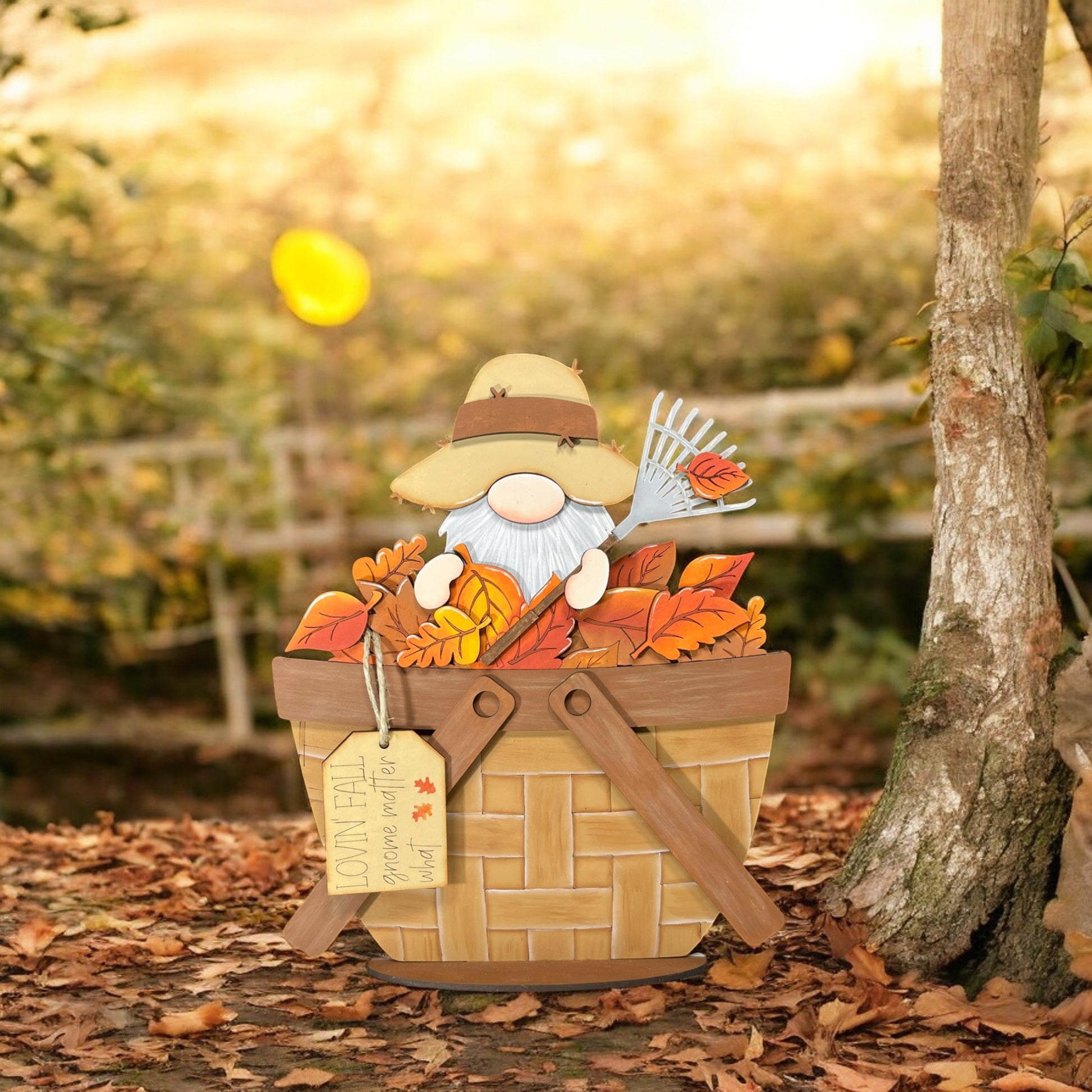 a scarecrow in a basket of leaves