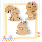 a wooden cutout of a squirrel holding an umbrella