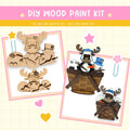 a wooden craft kit with a picture of a dog in a basket