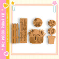 various wooden shapes, including a wooden fence, a wooden basket, and a wooden plant, arranged in a row.