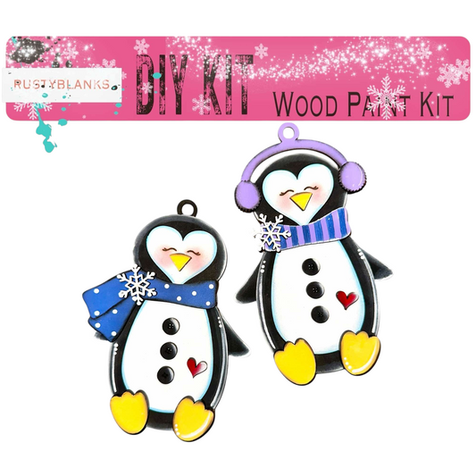 a pair of penguins wearing hats and scarfs