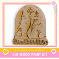 a DIY wood paint kit for creating a wooden snow globe with a bear and snowflakes.